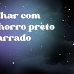 Sonhar com cachorro preto amarrado