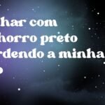 Sonhar com cachorro preto mordendo a minha mão