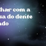 Sonhar com a presa do dente caindo