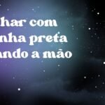 Sonhar com aranha preta picando a mão