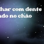 Sonhar com dente caindo no chão