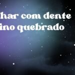 Sonhar com dente canino quebrado