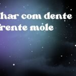 Sonhar com dente da frente mole