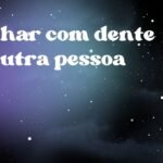 Sonhar com dente de outra pessoa