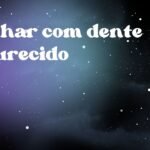 Sonhar com dente escurecido