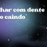 Sonhar com dente falso caindo