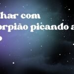 Sonhar com escorpião picando a mão