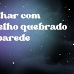 Sonhar com espelho quebrado na parede